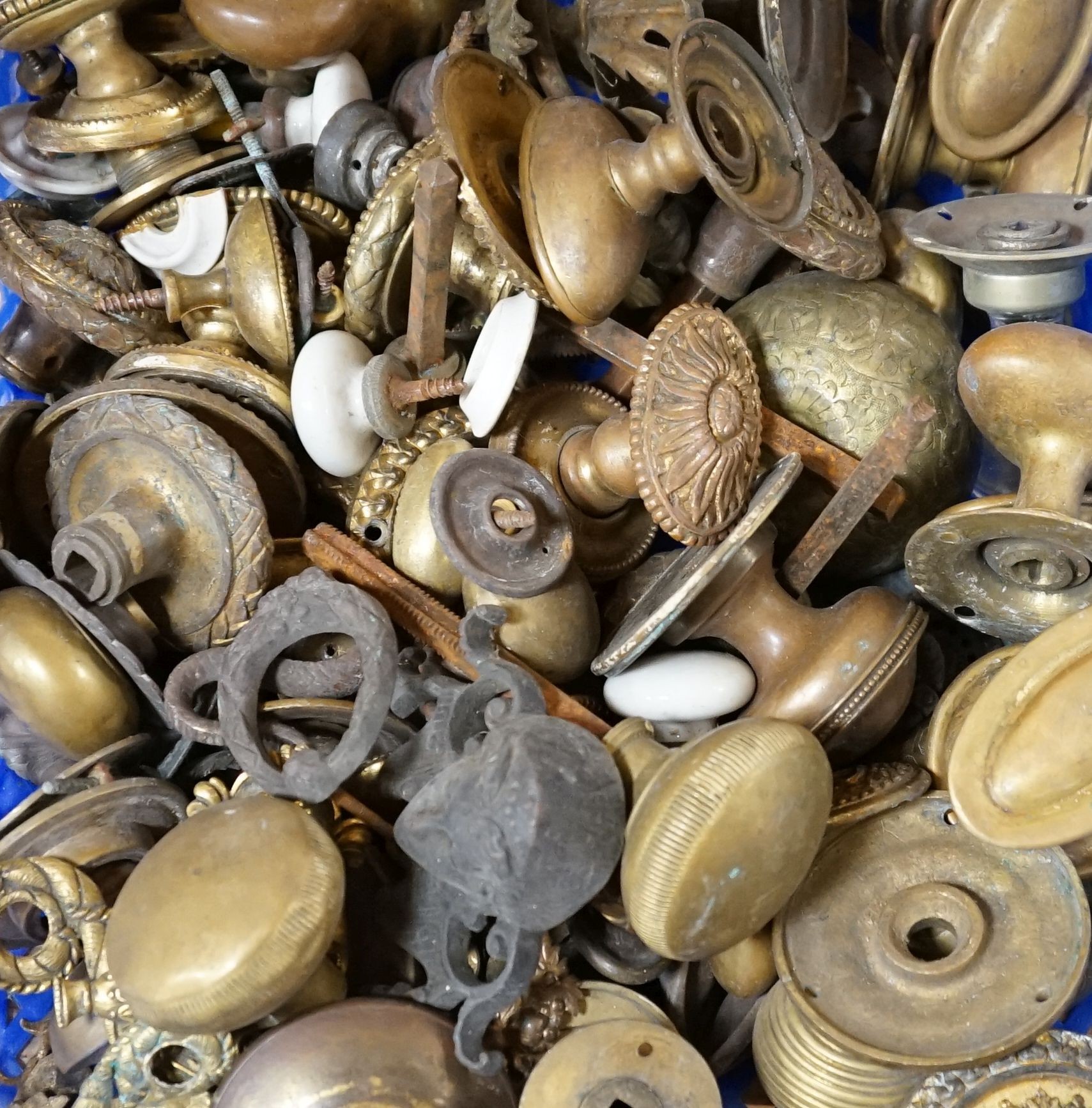 A quantity of decorative fittings and a quantity of various door knobs, etc.